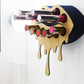 Black Small Lip Design Lipstick Organizer holding 10 lipsticks mounted on the wall with lipstick easily accessible and organized. Hanging Lipstick Holder that looks like wall art.