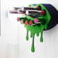 Black Small Lip Design Lipstick Organizer holding 10 lipsticks mounted on the wall with lipstick easily accessible and organized. Hanging Lipstick Holder that looks like wall art.