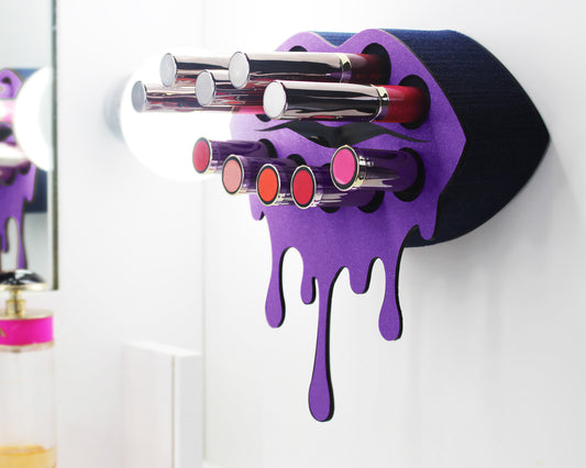 Purple Small Lip Design Lipstick Organizer holding 10 lipsticks mounted on the wall with lipstick easily accessible and organized. Hanging Lipstick Holder that looks like wall art.
