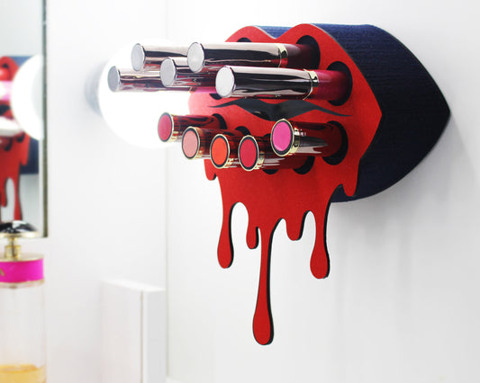 Red Small Lip Design Lipstick Organizer holding 10 lipsticks mounted on the wall with lipstick easily accessible and organized. Hanging Lipstick Holder that looks like wall art.